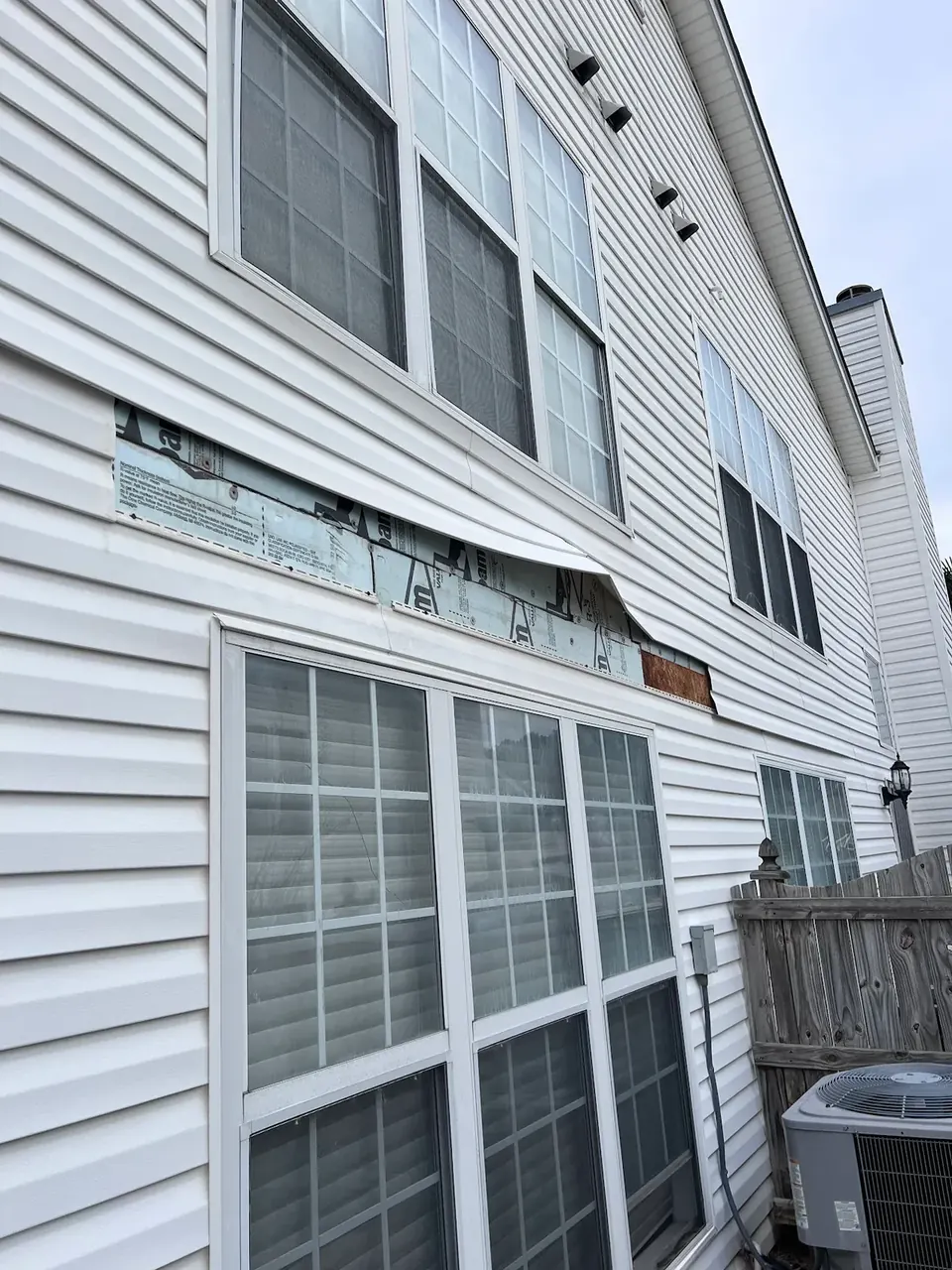 Siding Repair: Before & After by QWR in Newnan, GA